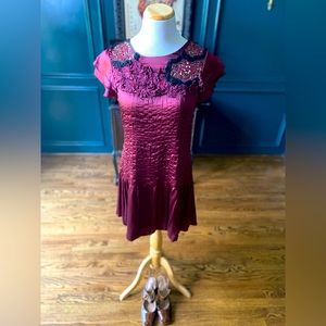 Dress with appliqué design